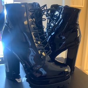 Black patent leather boots. Fashion Nova